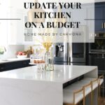 Styled kitchen with dark cabinets and brass finishes