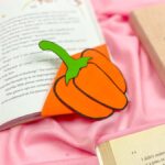 Pumpkin corner bookmark in a book