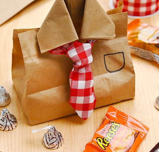 Cute Father's Day gift bag made with a paper sandwich bag and plaid ribbon