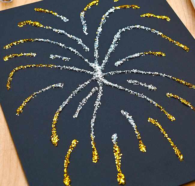 Silver and gold metallic fireworks art made with glue and glitter