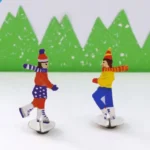 Magnetic ice skating theatre craft for kids made from a recycled cereal box